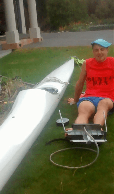 Installing my repaired footblock while my young cousin balances a frisbee to my head and films it