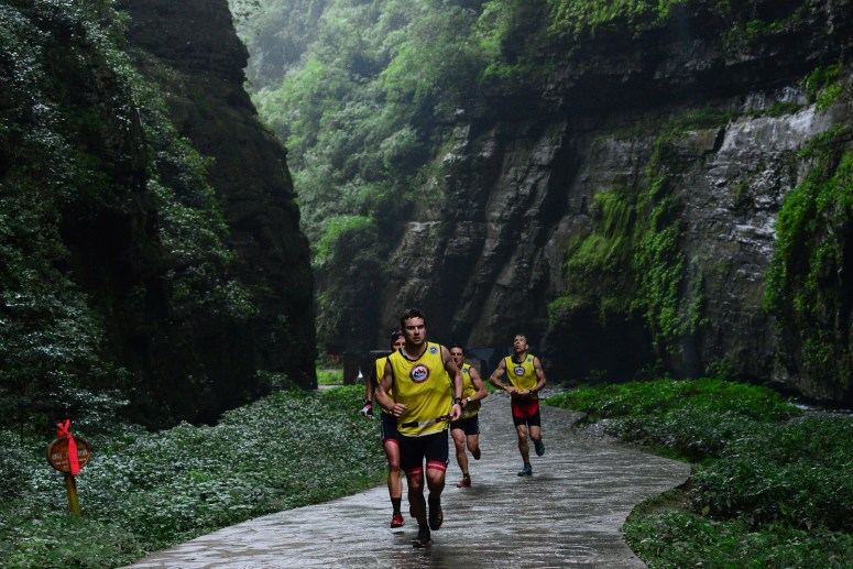 Near the end of the 7km last run, under the cliffs and about to ascend the steps to the finish line. Hamish leading the charge