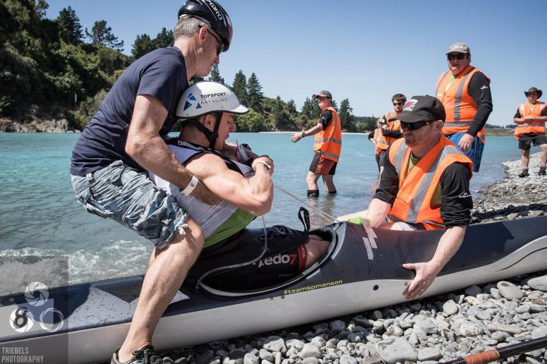 Tied up by the drinking tubes! Kayak take-out Photo Credit: Triebels Photography